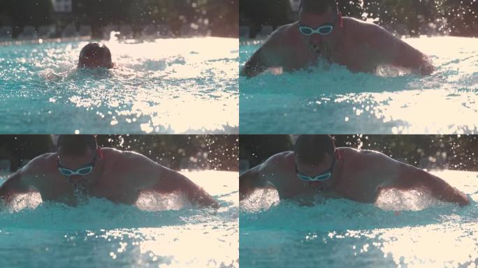 超级慢动作-时间扭曲效果男子完美蝶泳，熟练地通过水溅在健康俱乐部游泳池