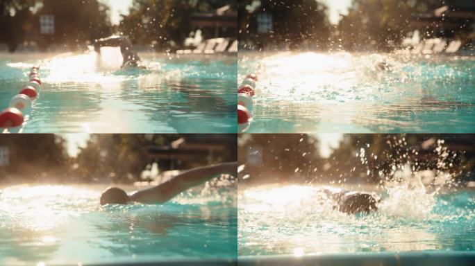 SLO MO专门的男子游泳运动员在水晶清澈的度假村游泳池完善游泳技术