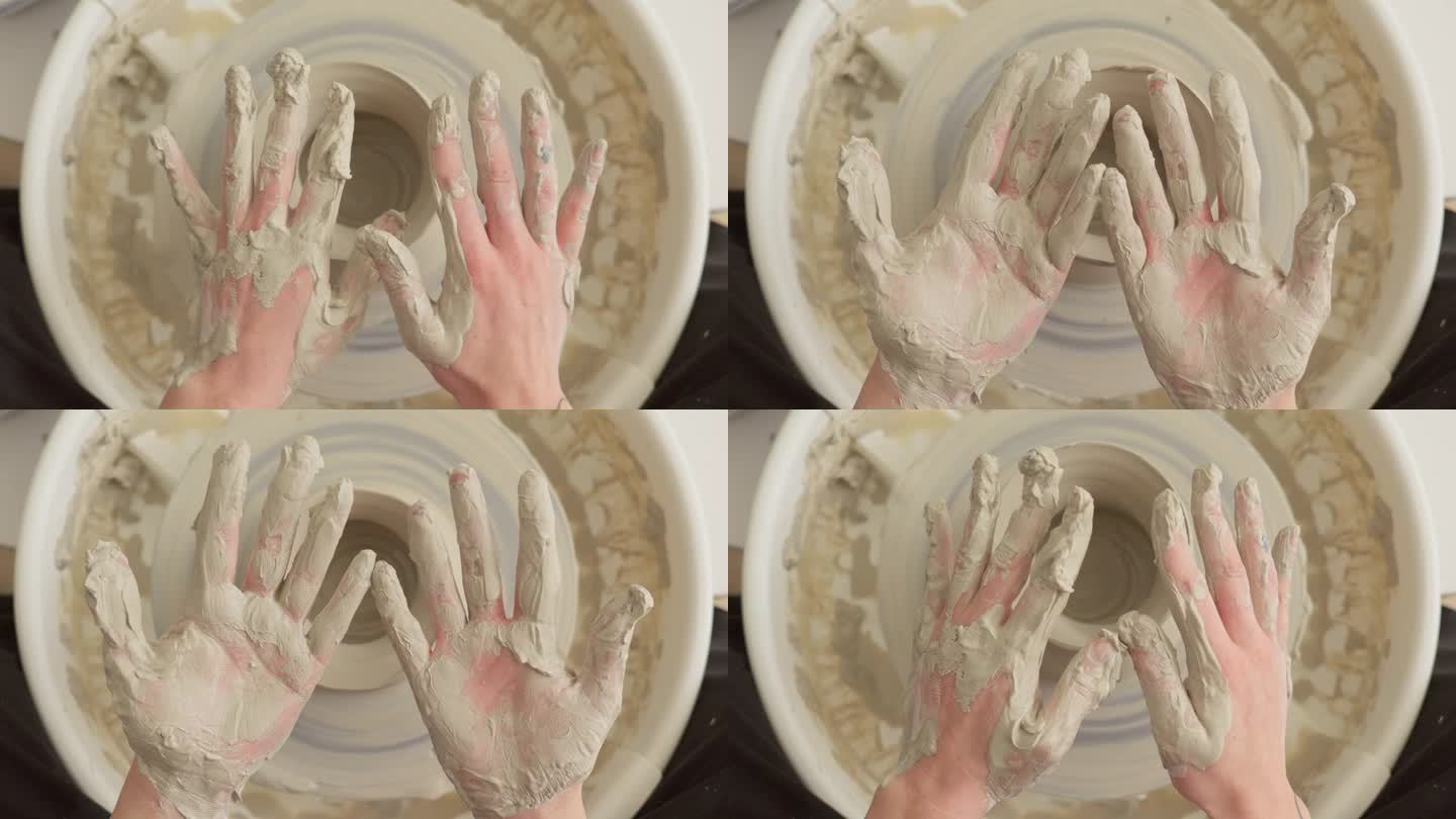 陶艺师在完成工艺后清洗双手的黏泥
