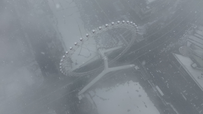 天津摩天轮雪景4K航拍视频