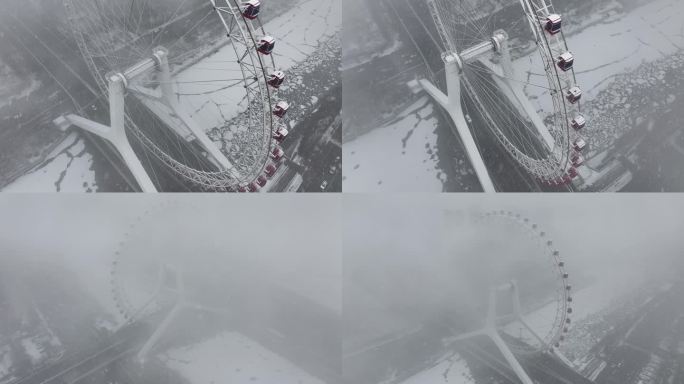 天津摩天轮雪景4K航拍视频