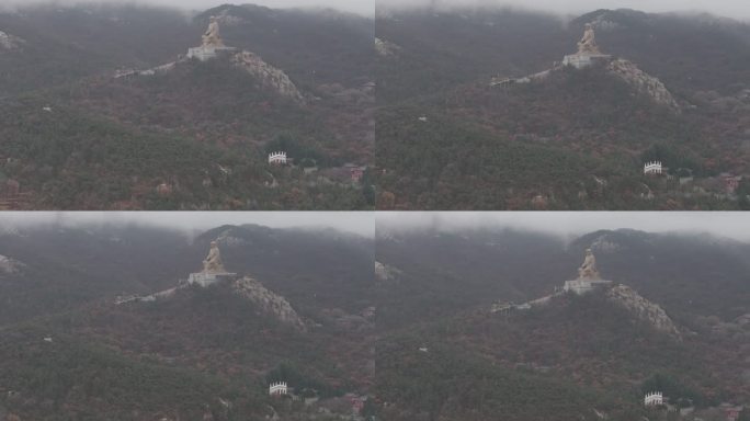 航拍冬季雨天云雾山东荣成石岛赤山明神座像