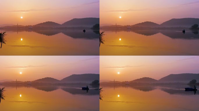 太湖日出水面小船