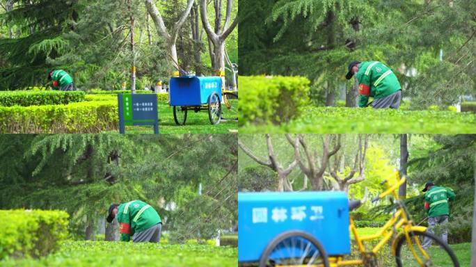 公园里环卫工人修剪花草