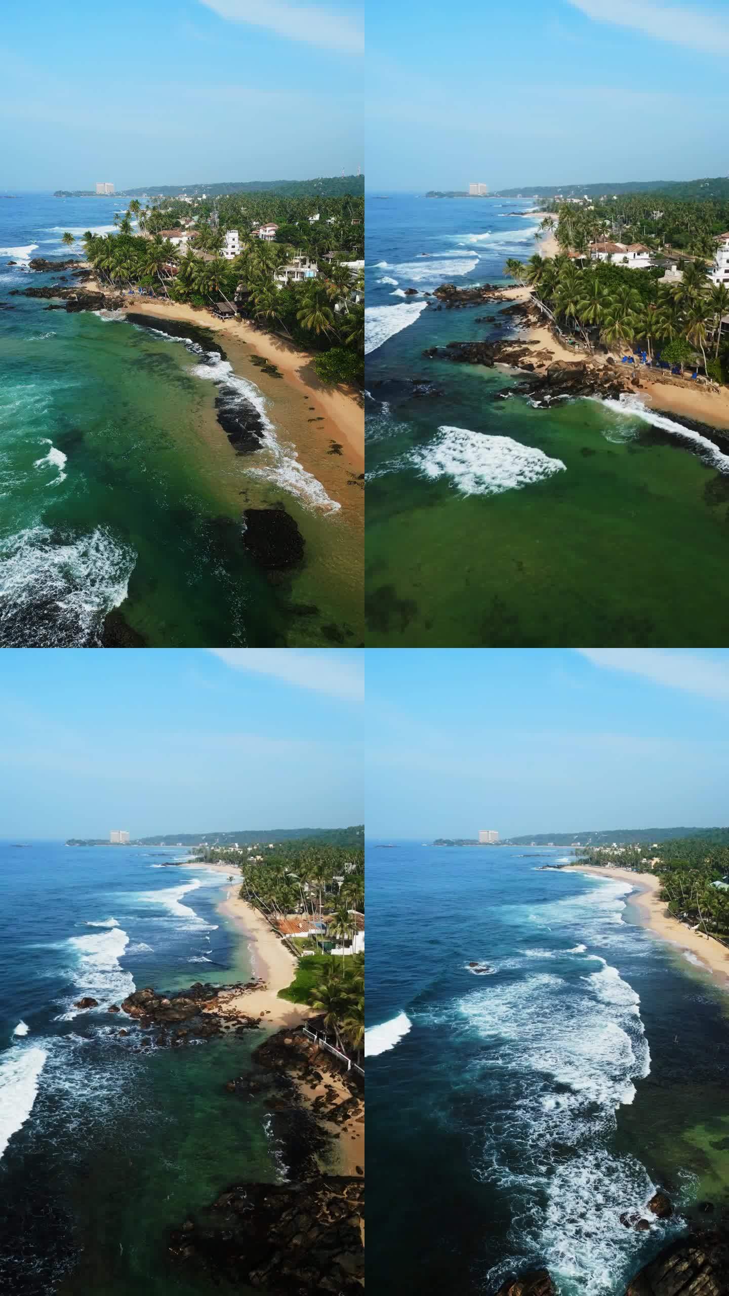 鸟瞰图显示达拉韦拉海滩沙滩，清澈的泻湖，充满活力的珊瑚礁在斯里兰卡海岸。游客日光浴、游泳、漫步热带天