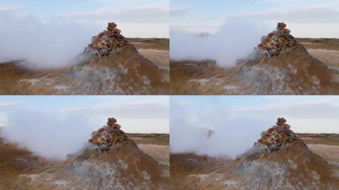 冰岛一个硫磺烟熏炉喷出的白色蒸汽被风吹走了。