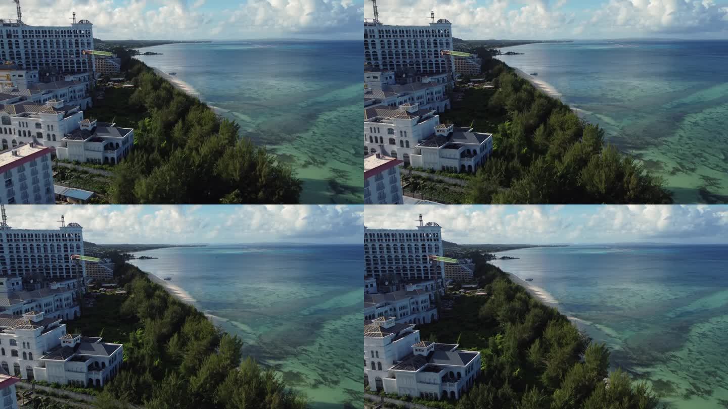 无人机拍摄的建筑物和树木沿塞班岛海岸线