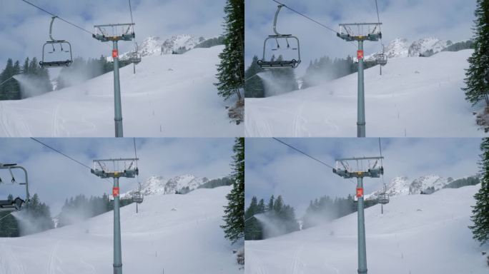 在瑞士布伦尼的恩格尔贝格滑雪胜地，升降椅和冰上飞行器在雪山上上下移动。