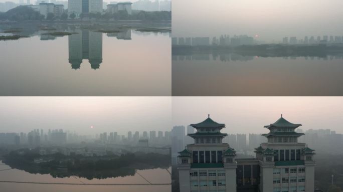 武汉中南民族大学图书馆双子楼冬季日出薄雾