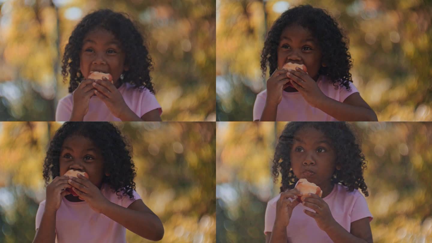黑人女孩吃苹果黑人人物