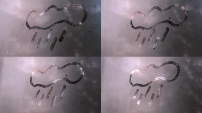 用手指在雾蒙蒙的玻璃上画云和雨的符号。