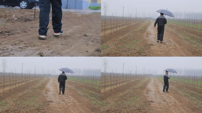 一个男人走在泥泞的道路