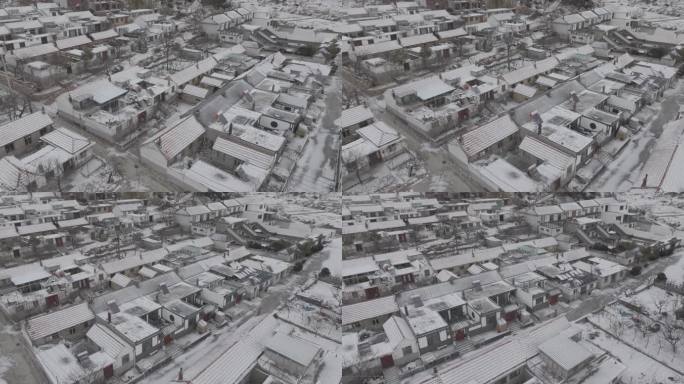 航拍威海市环翠区羊亭镇贝草夼村冬季雪景