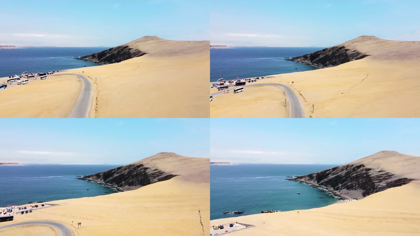 无人机鸟瞰图，公路沙滩，大浪和公路在沙漠悬崖碧海晴空蓝色停车场。秘鲁帕拉卡斯国家公园，4k