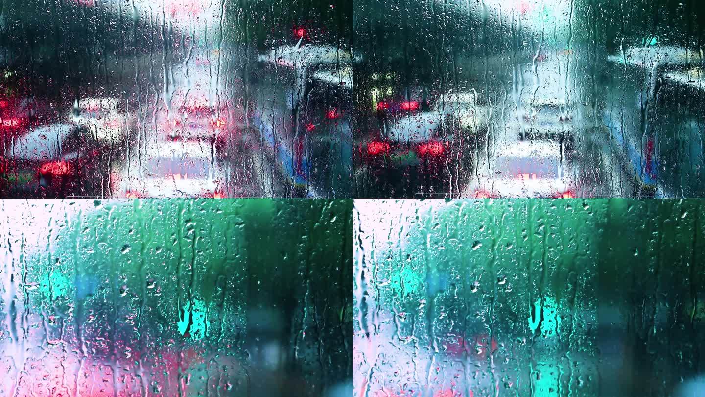下雨五彩斑斓的窗户上的雨水雨滴流水朦胧