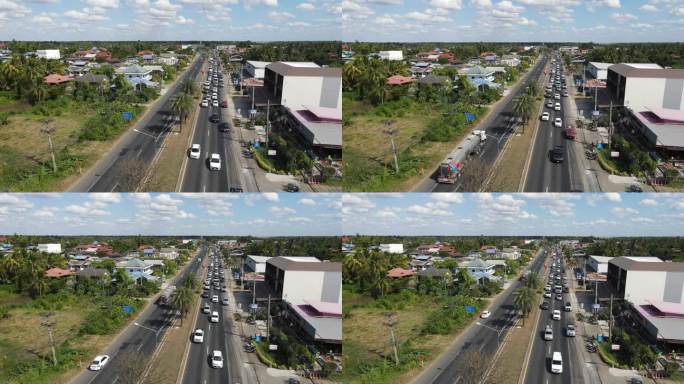 从无人机上鸟瞰新年期间高速公路上的交通堵塞，摄于2024年1月1日，泰国南荣武里拉姆。