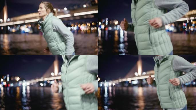 女子在博斯普鲁斯海峡慢跑，欣赏迷人的金角大桥夜景