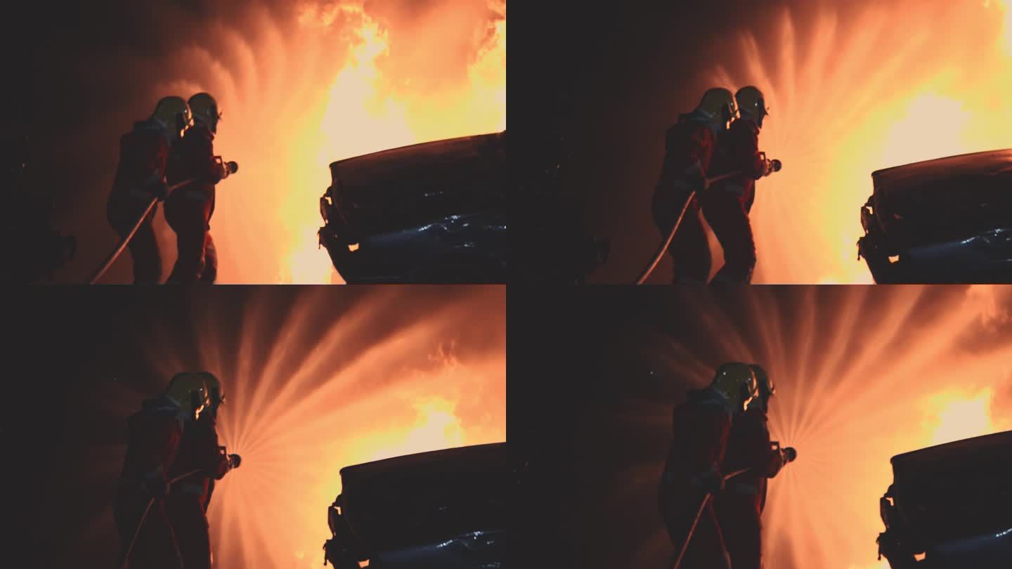 消防员和车祸救火喷水大火