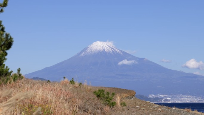 A clear blue sky and Mt. Fuji seen from the seasid