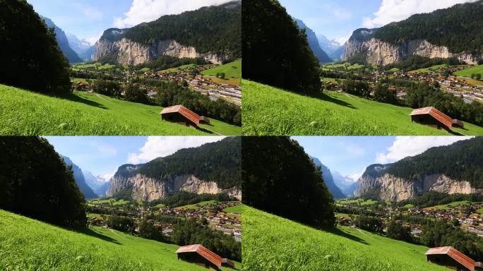 在一个阳光明媚的日子里，看到高山清新的绿色草地。Lauterbrunnen valley, Stau