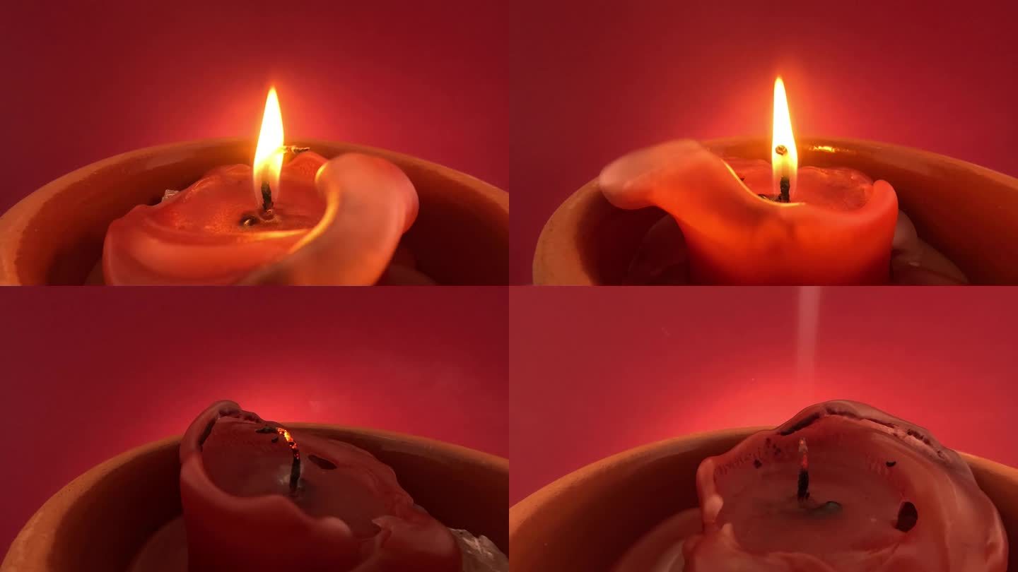 在烟雾缭绕的红色背景下点燃的红色蜡烛