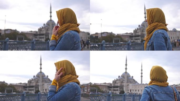 一名女子在Yeni Cami清真寺周围探索美景