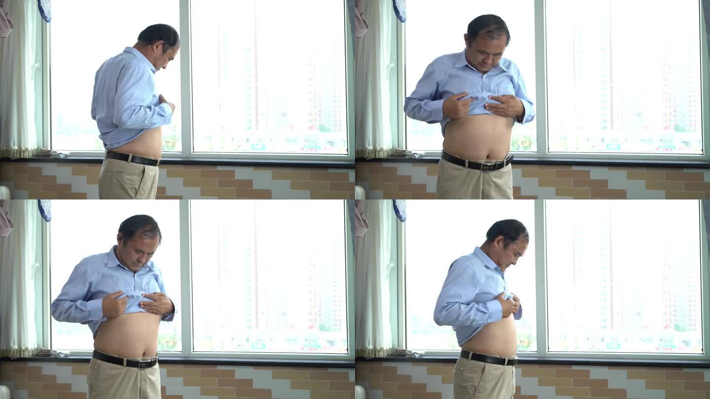 B123年轻男展示肚子变瘦减肥成功健康