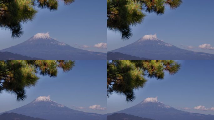 从海边看，湛蓝的天空和富士山