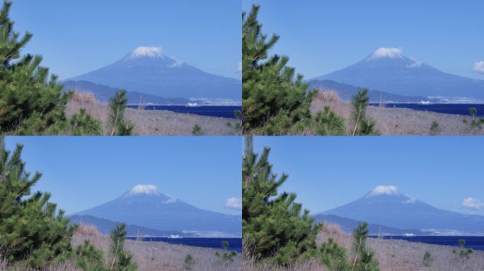 从海边看，湛蓝的天空和富士山