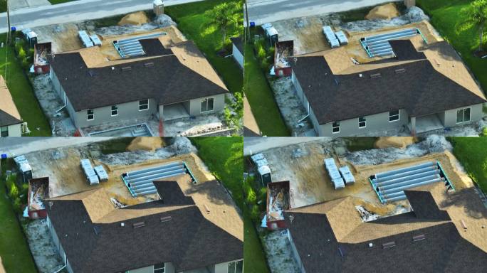 鸟瞰图的住宅私人住宅正在建设和院子地面工程与化粪池排水场安装在佛罗里达州安静的农村地区。房地产开发理