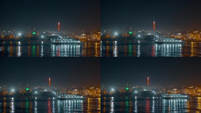 船的POV照明渡轮行驶在马尔马拉海上的城市景观对晴朗的天空在夜间伊斯坦布尔，土耳其
