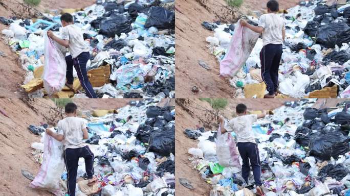 一个贫穷的男孩在郊区的垃圾填埋场收集垃圾。孩子们在这些工地工作以维持生计。贫困的概念。