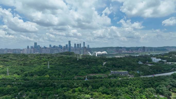 航拍晴天下的南宁市青秀山与五象新区