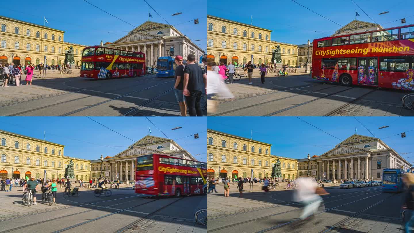 夏天，德国慕尼黑市中心的大型广场——马克斯-约瑟夫广场和慕尼黑国家大剧院，人山人海的游客步行和十字路