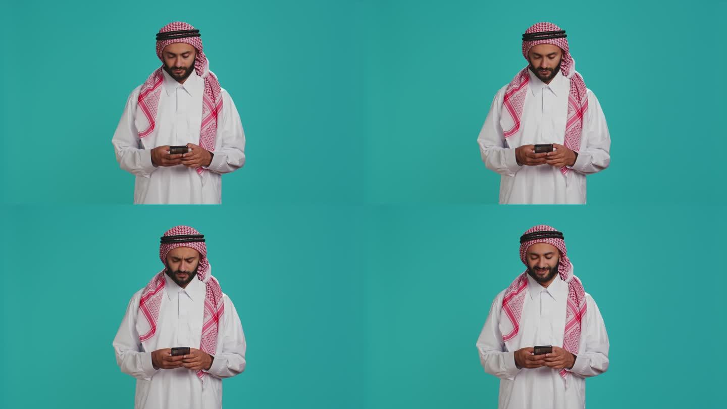 穆斯林男子浏览智能手机应用程序