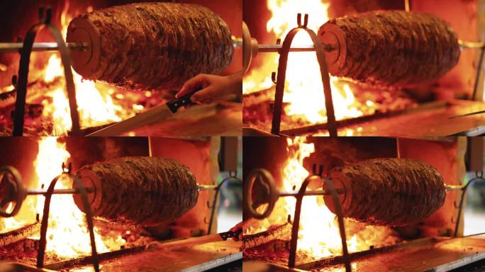 在伊斯坦布尔，土耳其的商业厨房里，厨师手持厨刀与烤肉串准备的SLO MO手持镜头