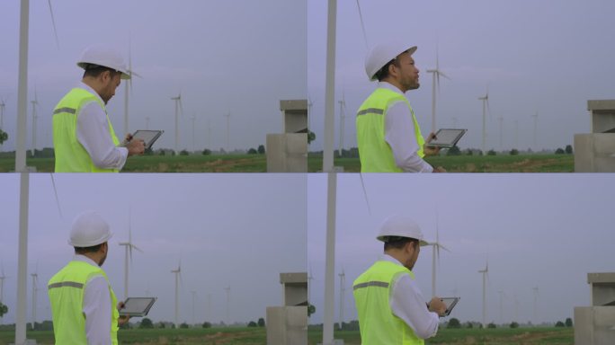亚洲工程师使用平板电脑进行维护检查，并优化风力涡轮机农场的操作。