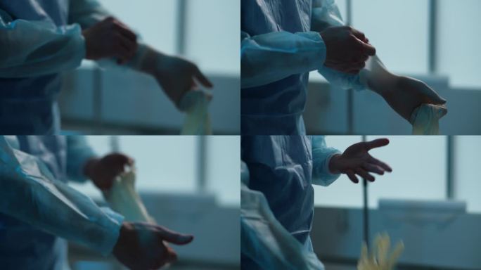 特写:黑暗的手术室里，外科手术成功后，无法辨认的男医生双手摘下手套。医护人员摘掉乳胶手套的特写镜头