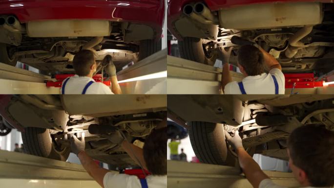 汽车修理工在服务站用液压检测工具检查汽车悬架和转向。专业人员制服检查汽车起落架、车轮的安全，并在车库