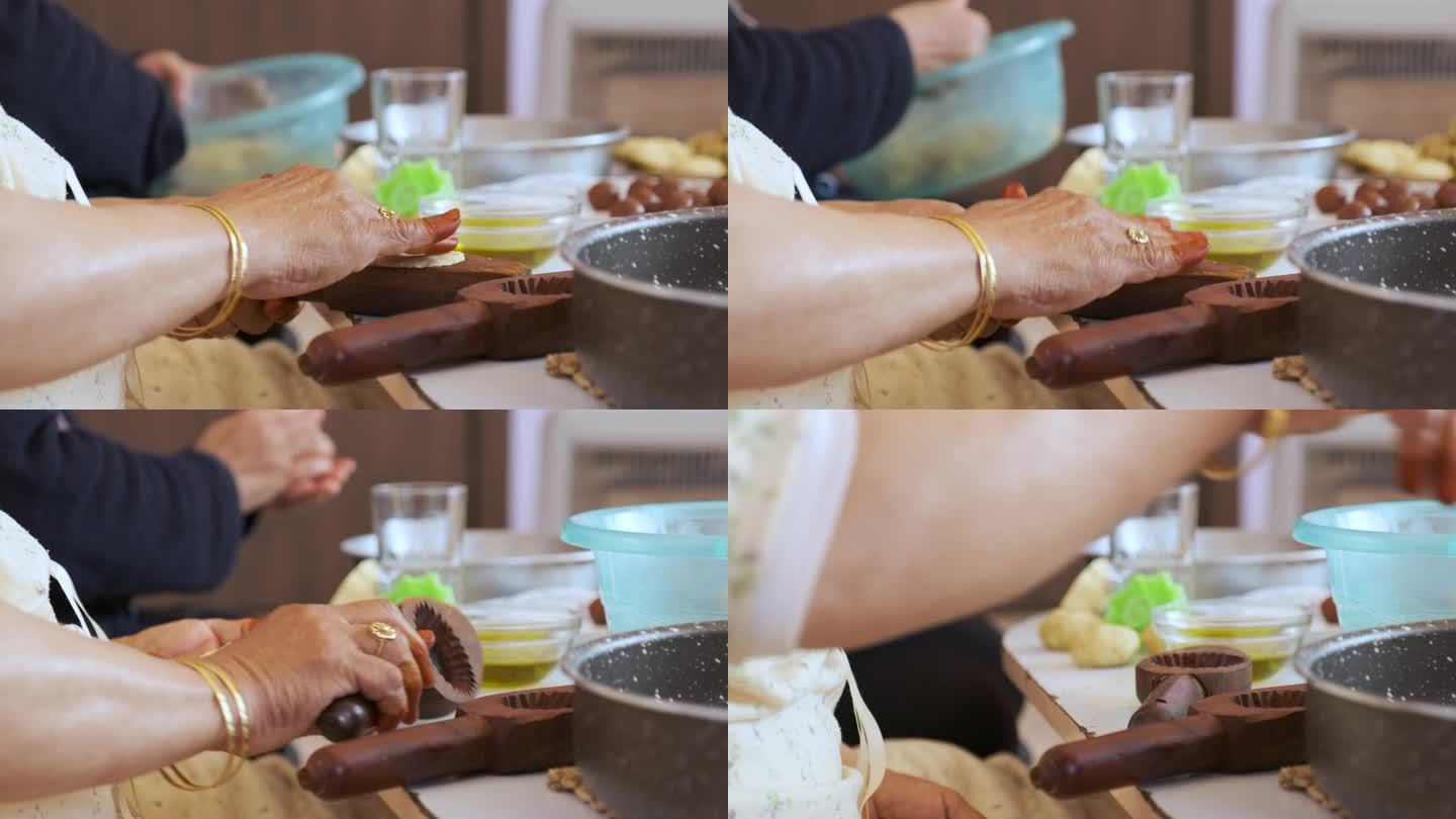 阿拉伯女性在家里用手制作开斋节糖果，看起来很漂亮，上面有指甲花，庆祝开斋节