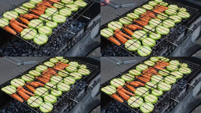 切碎的西葫芦和胡萝卜，用香草和香料在火上烤熟。美味的新鲜蔬菜烧烤烤炉格栅。素食烧烤。户外休闲