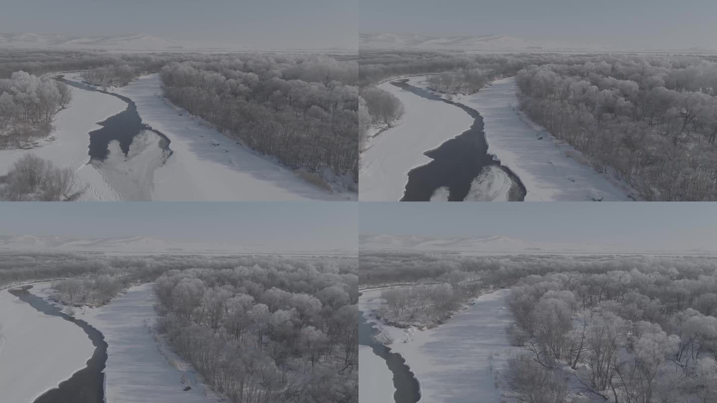 航拍雪景下的牙克石河流