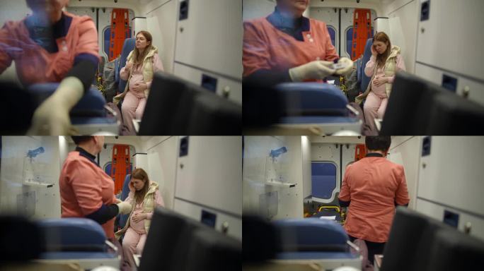 一名年轻的怀孕女孩在救护车里感到焦虑，她一直在抚摸自己的肚子，安慰自己和未出生的婴儿。
