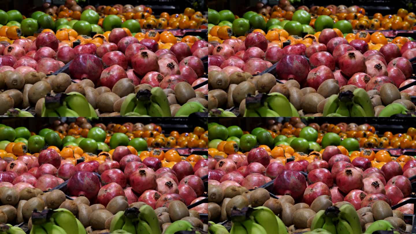 商店的柜台上或市场上有许多不同的水果。