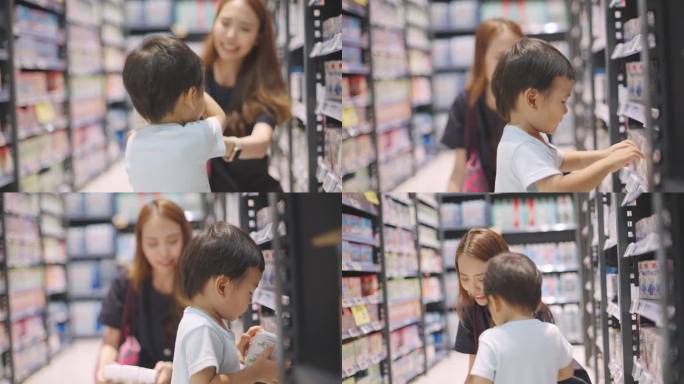 年轻漂亮的亚洲护士穿着工作服和她的儿子在医院下班后一起去购物中心的超市买食物。