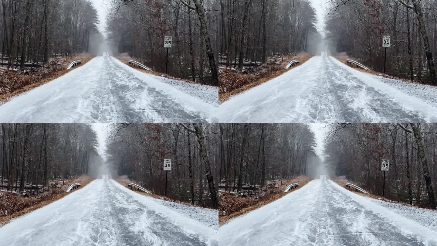 东北风期间，一场大雪落在了偏远而美丽的森林道路上