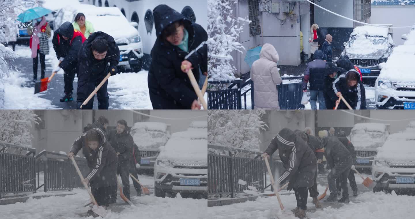 社区志愿者暴雪中铲雪