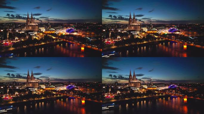 鸟瞰科隆大教堂，科隆中央车站和音乐圆顶在霍亨索伦桥与火车运行在日落时间在科隆市中心，德国的实时镜头
