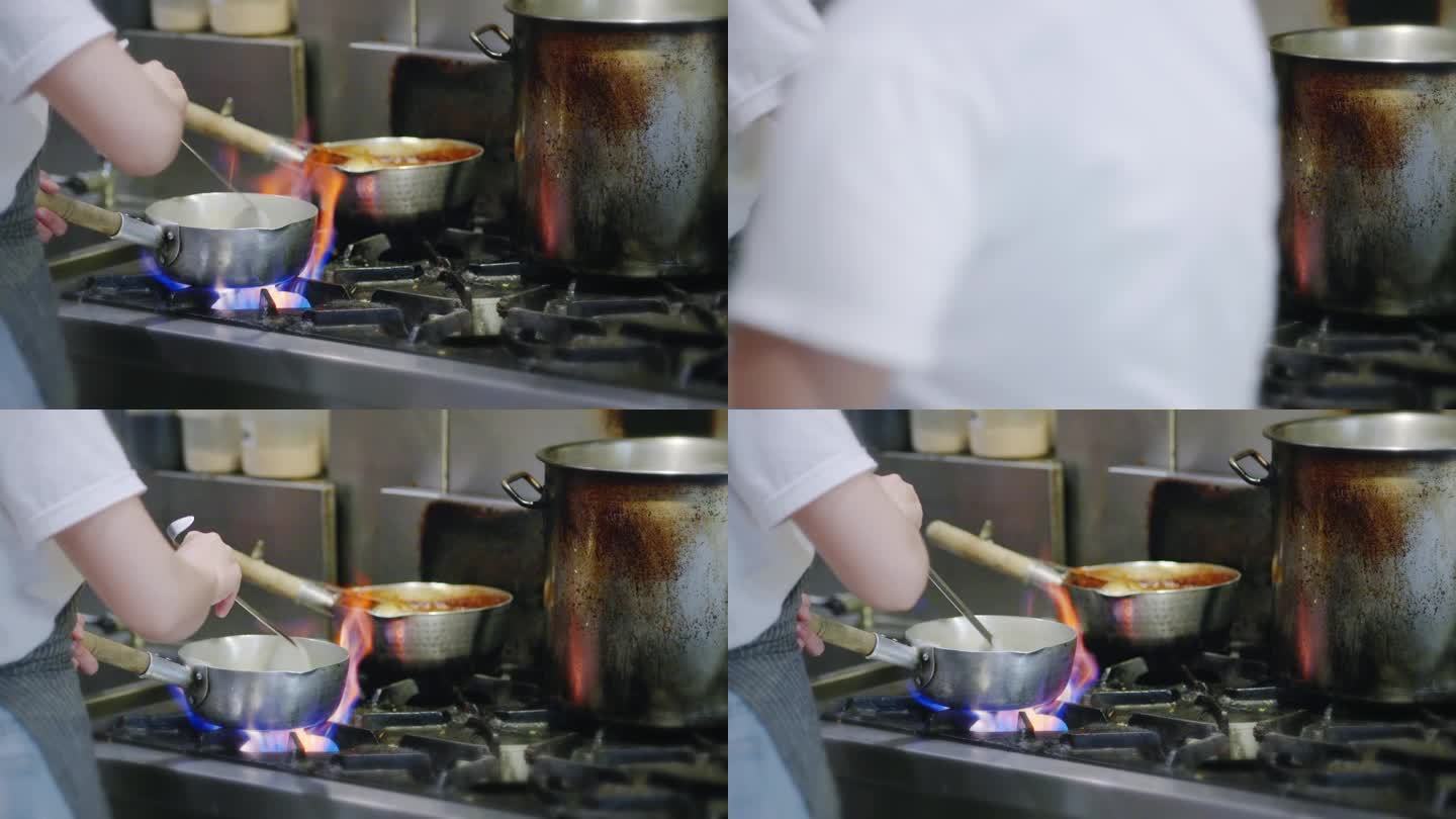 在日本餐厅的厨房里，厨师正在为拉面煮汤