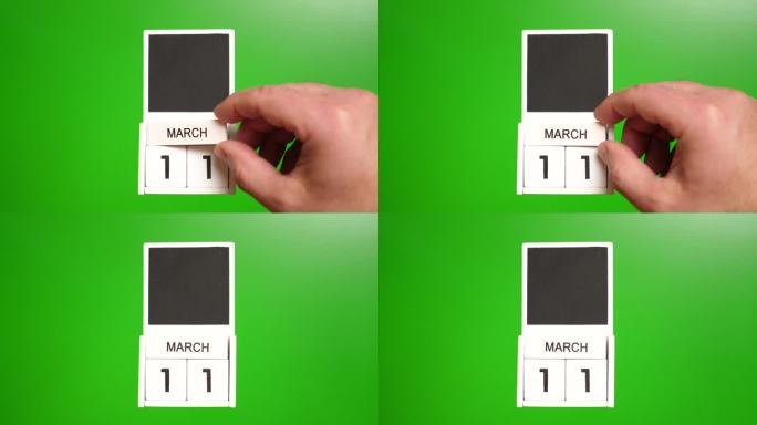 日历上的日期是3月11日，绿色的背景。说明某一特定日期的事件。